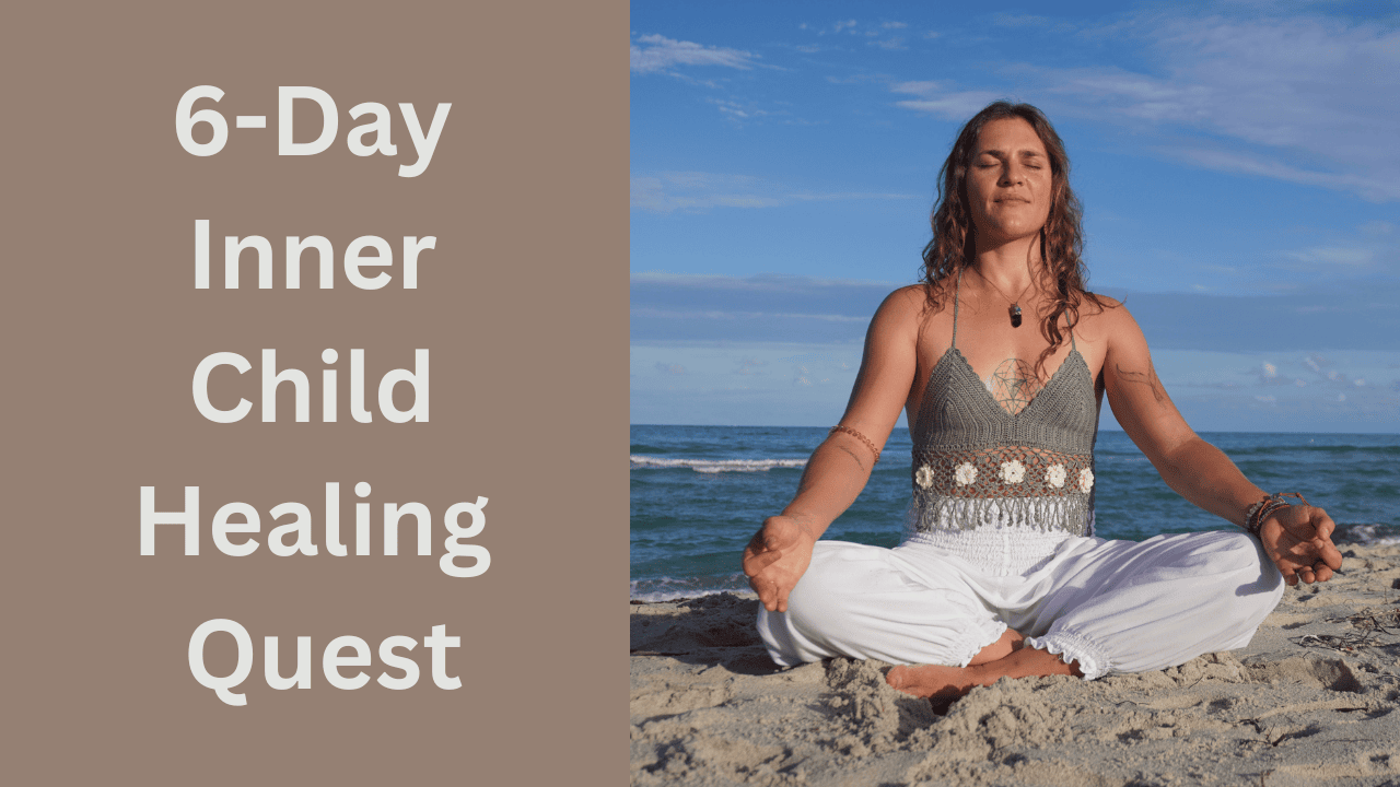 woman sitting in meditation on the beach